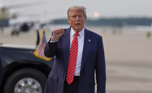 President Donald Trump gestures after arriving on Air Force One, Wednesday, June 25, 2025, at Joint Base Andrews, Md. (AP Photo/Alex Brandon)