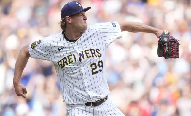 Milwaukee Brewers' Trevor Megill reacts after recording a save during the ninth inning of a baseball game against the St. Louis Cardinals, Sunday, June 15, 2025, in Milwaukee. (AP Photo/Aaron Gash)