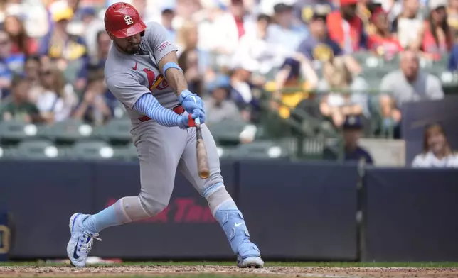 St. Louis Cardinals' Iván Herrera hits a solo home run during the eighth inning of a baseball game against the Milwaukee Brewers, Sunday, June 15, 2025, in Milwaukee. (AP Photo/Aaron Gash)