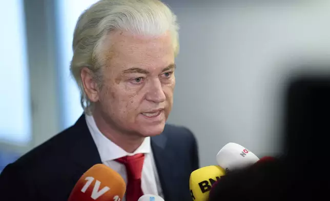 Far-right lawmaker Geert Wilders talks to the media after pulling his party out of the four-party Dutch coalition in The Hague, Netherlands, Tuesday, June 3, 2025. (AP Photo/Peter Dejong)