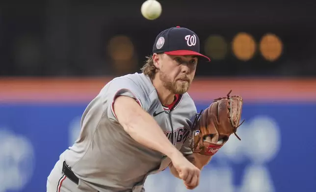 Washington Nationals' Jake Irvin pitches during the second inning of a baseball game against the New York Mets Wednesday, June 11, 2025, in New York. (AP Photo/Frank Franklin II)
