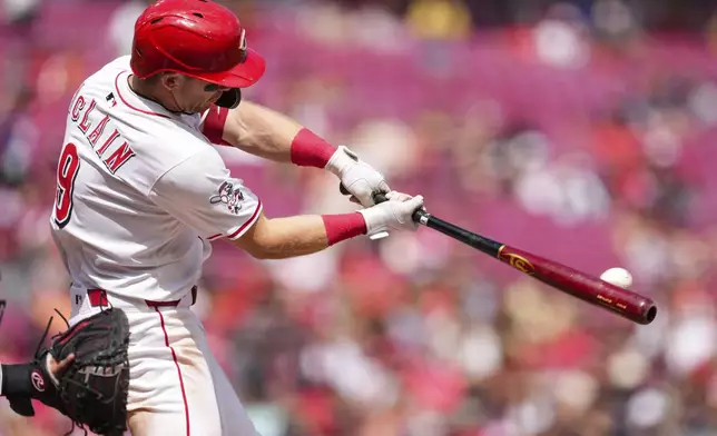 Cincinnati Reds' Matt McLain hits a two-run home run during the seventh inning of a baseball game against the Arizona Diamondbacks, Sunday, June 8, 2025, in Cincinnati. (AP Photo/Jeff Dean)