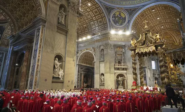 Pope Leo XIV celebrates a Mass in St. Peter's Basilica at the Vatican, where he will bless the pallia for the new metropolitan archbishops, Sunday, June 29, 2025. (AP Photo/Andrew Medichini)