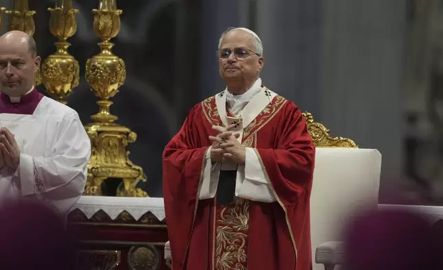 Pope Leo XIV celebrates a Mass in St. Peter's Basilica at the Vatican, where he will bless the pallia for the new metropolitan archbishops, Sunday, June 29, 2025. (AP Photo/Andrew Medichini)