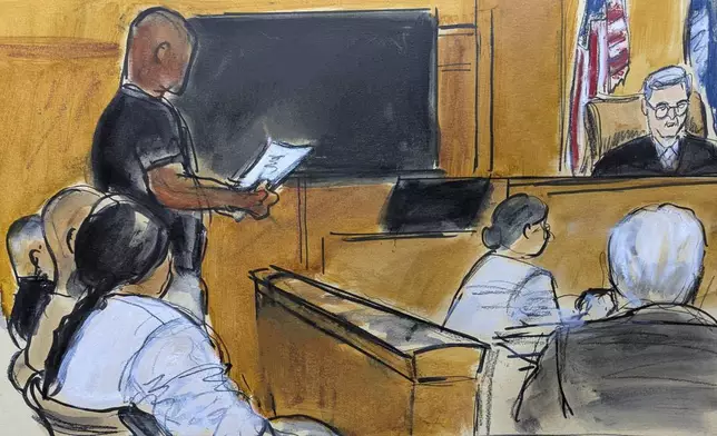 The Jury foreperson stands and reads the partial verdict during Harvey Weinstein's sexual misconduct trial in Manhattan criminal court, Wednesday, June 11, 2025, in New York. (Elizabeth Williams via AP)