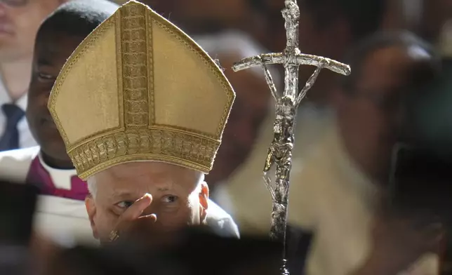 Pope Leo XIV arrives to celebrate an ordination Mass in St. Peter's Basilica at the Vatican as part of the Jubilee of Priests, Friday, June 27, 2025. (AP Photo/Alessandra Tarantino)