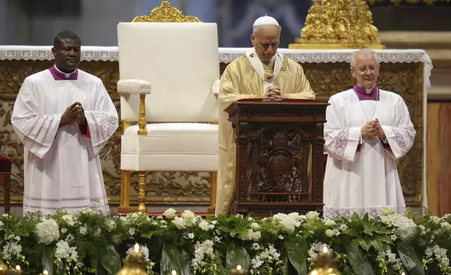 Pope Leo XIV prays during an ordination Mass in St. Peter's Basilica at the Vatican as part of the Jubilee of Priests, Friday, June 27, 2025. (AP Photo/Alessandra Tarantino)