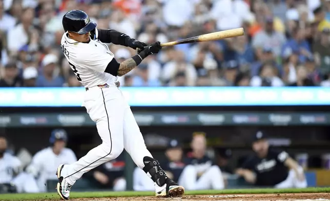 Detroit Tigers' Javier Báez bats during the third inning of a baseball game against the Minnesota Twins, Sunday, June 29, 2025, in Detroit. (AP Photo/Jose Juarez)