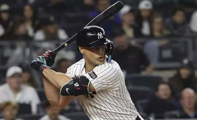 New York Yankees' Giancarlo Stanton bats during the sixth inning of a baseball game against the Los Angeles Angels, Monday, June 16, 2025, in New York. (AP Photo/Pamela Smith)
