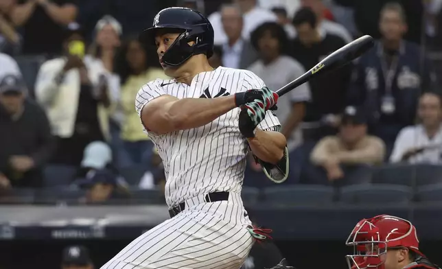 New York Yankees' Giancarlo Stanton bats during the first inning of a baseball game against the Los Angeles Angels, Monday, June 16, 2025, in New York. (AP Photo/Pamela Smith)