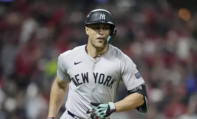 FILE - New York Yankees' Giancarlo Stanton runs the bases during the sixth inning in Game 4 of the baseball AL Championship Series against the Cleveland Guardians, Oct. 18, 2024, in Cleveland. (AP Photo/Godofredo A. Vásquez, file)