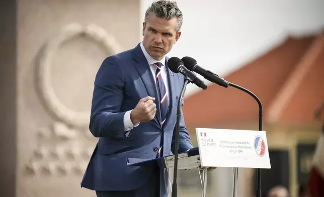 U.S. Defense Secretary Pete Hegseth delivers a speech during the international ceremony commemorating the 81st anniversary of the D-Day landings, Friday, June 6, 2025 on Utah Beach, Normandy. (AP Photo/Thomas Padilla)