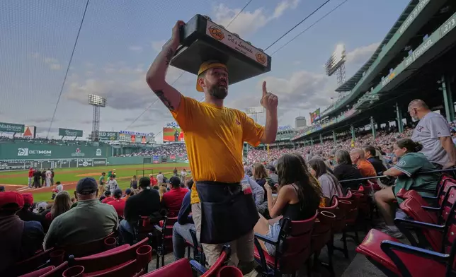 A vendor sells lemonade at Fenway Park, Monday, June 2, 2025, in Boston. (AP Photo/Robert F. Bukaty)