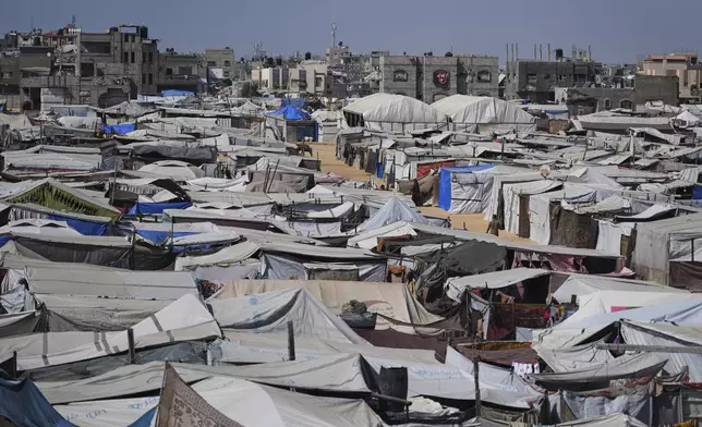 A makeshift tent camp for displaced Palestinians is seen in Khan Younis, Gaza, Friday, June 6, 2025. (AP Photo/Abdel Kareem Hana)