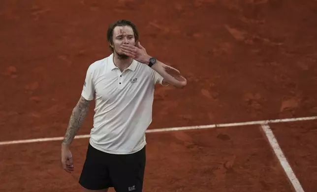 Kazakhstan's Alexander Bublik as he won the fourth round match of the French Tennis Open against Britain's Jack Draper at the Roland-Garros stadium in Paris, Monday, June 2, 2025. (AP Photo/Christophe Ena)