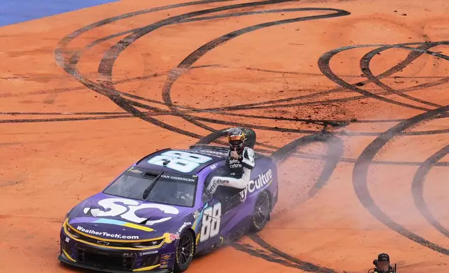 Shane Van Gisbergen celebrates after winning a NASCAR Cup Series auto race at Hermanos Rodríguez race track in Mexico City, Sunday, June 15, 2025. (AP Photo/Marco Ugarte)