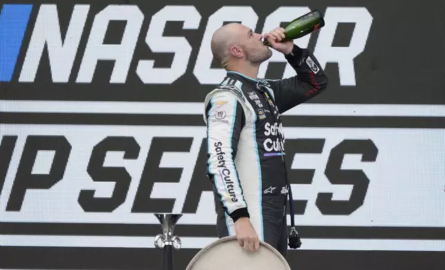 Shane Van Gisbergen celebrates after winning a NASCAR Cup Series auto race at Hermanos Rodríguez race track in Mexico City, Sunday, June 15, 2025. (AP Photo/Fernando Llano)
