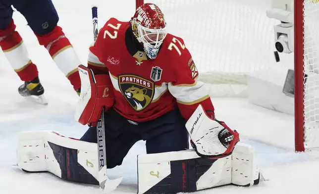Florida Panthers goalie Sergei Bobrovsky (72) makes a save against the Edmonton Oilers during the third period in Game 4 of the NHL hockey Stanley Cup Final in Sunrise, Fla., Thursday, June 12, 2025. (Nathan Denette/The Canadian Press via AP)