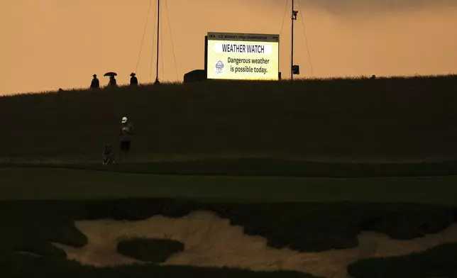 A weather alert is seen along the first fairway during the second round of the U.S. Women's Open golf tournament at Erin Hills Friday, May 30, 2025, in Erin, Wis. (AP Photo/Jeff Roberson)