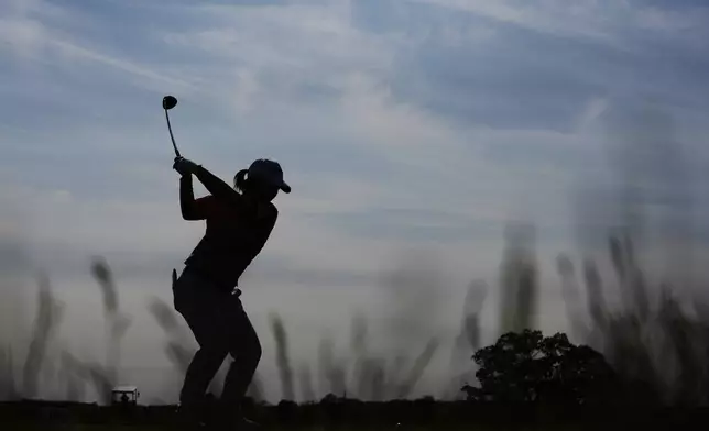 Mao Saigo, of Japan, hits from the 15th tee during the fourth round of the U.S. Women's Open golf tournament at Erin Hills Sunday, June 1, 2025, in Erin, Wis. (AP Photo/Matt York)