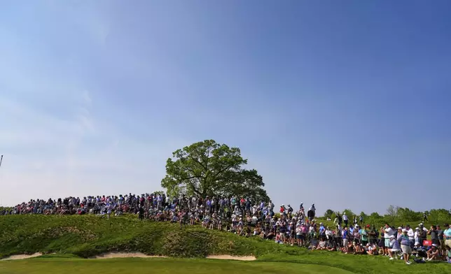 Fans line the 16th hole during the fourth round of the U.S. Women's Open golf tournament at Erin Hills Sunday, June 1, 2025, in Erin, Wis. (AP Photo/Matt York)