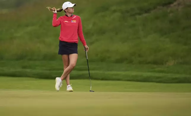 Sarah Schmelzel waits to putt on the 17th hole during the second round of the U.S. Women's Open golf tournament at Erin Hills Friday, May 30, 2025, in Erin, Wis. (AP Photo/Jeff Roberson)