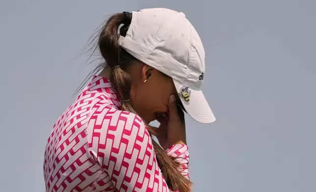 Aline Krauter, of Germany, reacts on the seventh hole during the fourth round of the U.S. Women's Open golf tournament at Erin Hills Sunday, June 1, 2025, in Erin, Wis. (AP Photo/Matt York)