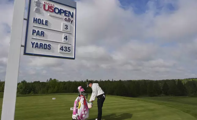 Chisato Iwai, of Japan, gets ready to tee off on the third hole during the first round of the U.S. Women's Open golf tournament at Erin Hills Thursday, May 29, 2025, in Erin, Wis. (AP Photo/Jeff Roberson)
