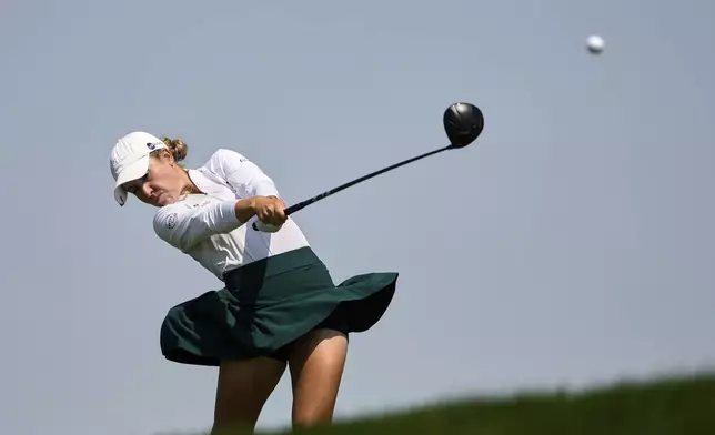 Chiara Tamburlini, of Switzerland, hits on the 12th hole during the third round of the U.S. Women's Open golf tournament at Erin Hills Saturday, May 31, 2025, in Erin, Wis. (AP Photo/Matt York)