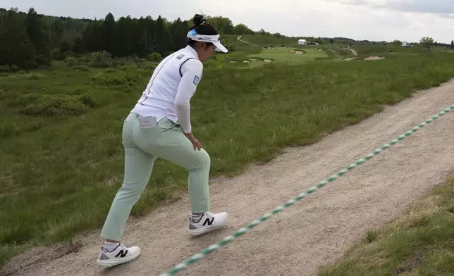 Miyu Yamashita, of Japan, walks to the third hole during the first round of the U.S. Women's Open golf tournament at Erin Hills Thursday, May 29, 2025, in Erin, Wis. (AP Photo/Jeff Roberson)