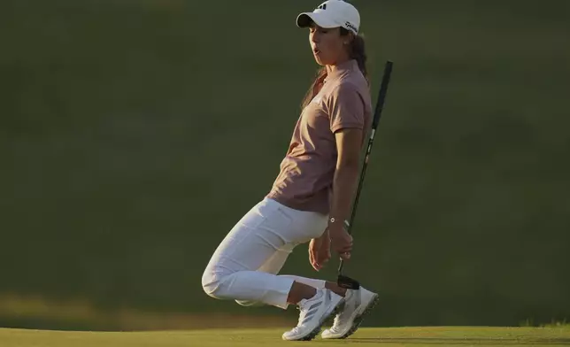 Julia Lopez Ramirez, of Spain, reacts to a missed birdie putt on the ninth hole during the first round of the U.S. Women's Open golf tournament at Erin Hills Thursday, May 29, 2025, in Erin, Wis. (AP Photo/Jeff Roberson)