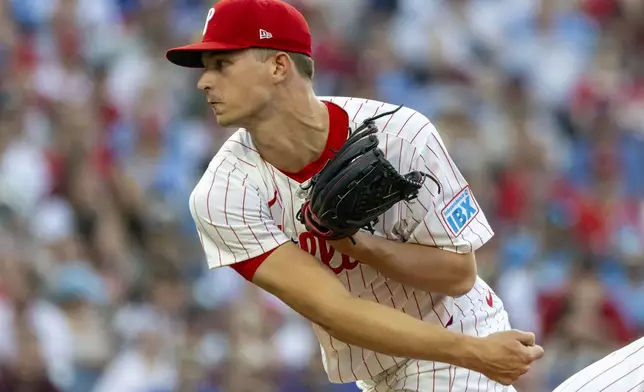 Philadelphia Phillies starting pitcher Mick Abel throws during the first inning of a baseball game against the New York Mets, Saturday, June 21, 2025, in Philadelphia. (AP Photo/Laurence Kesterson)