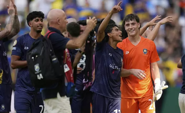 Auckland City's Nathan Garrow, right, and Auckland City's Jerson Lagos celebrate after the Club World Cup Group C soccer match between Auckland City and Boca Juniors in Nashville, Tenn., Tuesday, June 24, 2025. (AP Photo/George Walker IV)