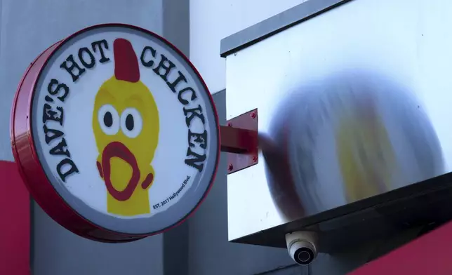 The loo for Dave's Hot Chicken restaurant is seen in the Little Tokyo district of Los Angeles Monday, June 2, 2025. (AP Photo/Damian Dovarganes)