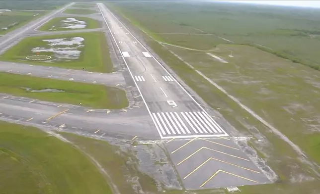 In this image from undated video released by the Office of Attorney General James Uthmeier shows an isolated Everglades airfield about 45 miles (72 kms.) west of Miami that Florida officials said an immigration detention facility dubbed "Alligator Alcatraz" is just days away from being operational. (Courtesy of the Office of Attorney General James Uthmeier via AP)