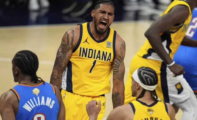 Indiana Pacers forward Obi Toppin (1) celebrates a basket against the Oklahoma City Thunder during the second half of Game 4 of the NBA Finals basketball series, Friday, June 13, 2025, in Indianapolis. (AP Photo/Abbie Parr)