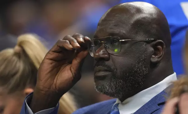 Shaquille O'Neal watches the first half of Game 2 of the NBA Finals basketball series between the Indiana Pacers and the Oklahoma City Thunder Sunday, June 8, 2025, in Oklahoma City. (AP Photo/Julio Cortez)