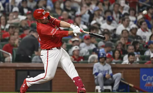 St. Louis Cardinals' Pedro Pages hits a two-run home run in the second inning of a baseball game against the Los Angeles Dodgers, Friday, June 6, 2025, in St. Louis. (AP Photo/Joe Puetz)
