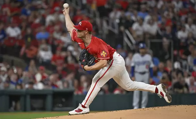 St. Louis Cardinals starting pitcher Sonny Gray throws in the first inning of a baseball game against the Los Angeles Dodgers, Friday, June 6, 2025, in St. Louis. (AP Photo/Joe Puetz)