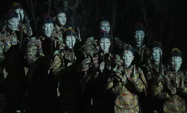 Performers of the Greek National Opera play Giacomo Puccini's "Turandot" during the 70th Athens Epidaurus Festival at the Odeon of Herodes Atticus in Athens, Greece, Tuesday, June 3, 2025. (AP Photo/Thanassis Stavrakis)
