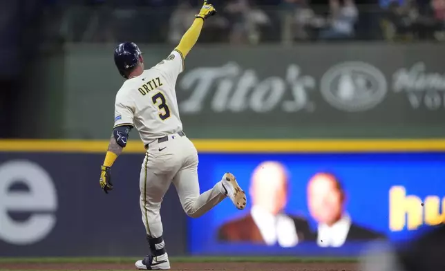 Milwaukee Brewers' Joey Ortiz rounds the bases after hitting a solo home run during the fourth inning of a baseball game against the Pittsburgh Pirates, Tuesday, June 24, 2025, in Milwaukee. (AP Photo/Aaron Gash)