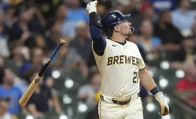 Milwaukee Brewers' Caleb Durbin flips his bat after hitting a three-run home run during the fourth inning of a baseball game against the Pittsburgh Pirates, Tuesday, June 24, 2025, in Milwaukee. (AP Photo/Aaron Gash)