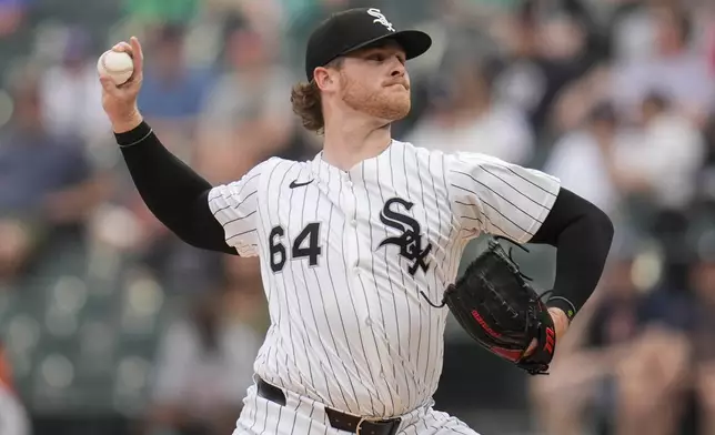 Chicago White Sox starting pitcher Shane Smith (64) throws against the Detroit Tigers during the first inning of a baseball game Tuesday, June 3, 2025, in Chicago. (AP Photo/Erin Hooley)