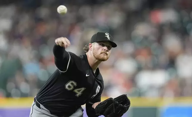 Chicago White Sox starting pitcher Shane Smith throws against the Houston Astros during the first inning of a baseball game Tuesday, June 10, 2025, in Houston. (AP Photo/David J. Phillip)