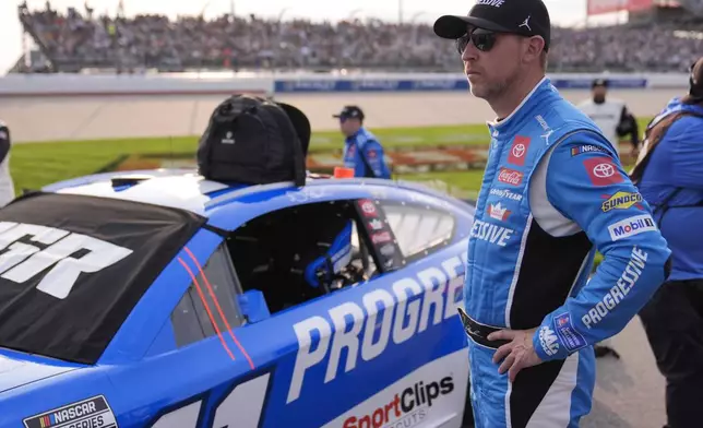 Denny Hamlin waits for the start of a NASCAR Cup Series auto race Sunday, June 1, 2025, in Lebanon, Tenn. (AP Photo/George Walker IV)