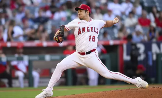 Los Angeles Angels pitcher Yusei Kikuchi delivers a pitch during the first inning of a baseball game against the Athletics, Monday, June 9, 2025, in Anaheim, Calif. (AP Photo/William Liang)