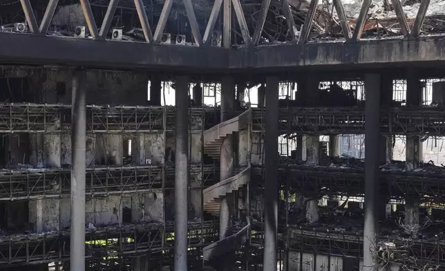 The damaged headquarters of Islamic Republic of Iran Broadcasting, Iranian state television, is seen in Tehran, Iran, Thursday, June 19, 2025. (AP Photo/Vahid Salemi)