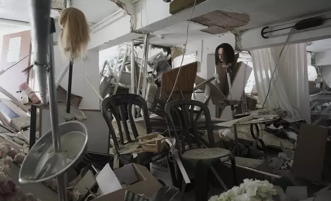 Personal objects at the site of a direct hit from an Iranian missile strike in an apartment in Ramat Gan, Israel, Thursday, June 19, 2025. (AP Photo/Oded Balilty)