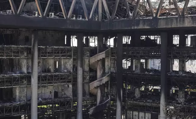 The damaged headquarters of Islamic Republic of Iran Broadcasting, Iranian state television, is seen in Tehran, Iran, Thursday, June 19, 2025. (AP Photo/Vahid Salemi)