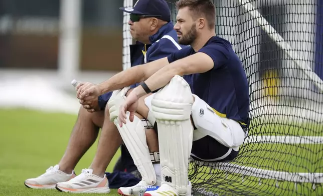 South Africa head coach Shukri Conrad, left, and Aiden Markram attend a nets session at Lord's, London, Monday June 9, 2025. (Ben Whitley/PA via AP)